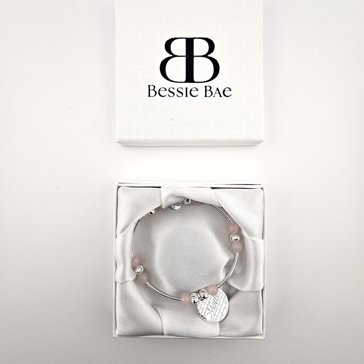 Rose quartz and silver beaded bracelet displayed in Bessie Bae gift box.