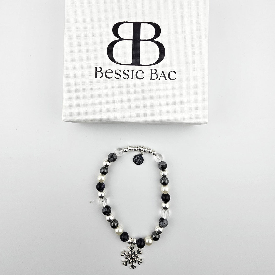 Elegant silver and gemstone bracelet symbolising balance and clarity.