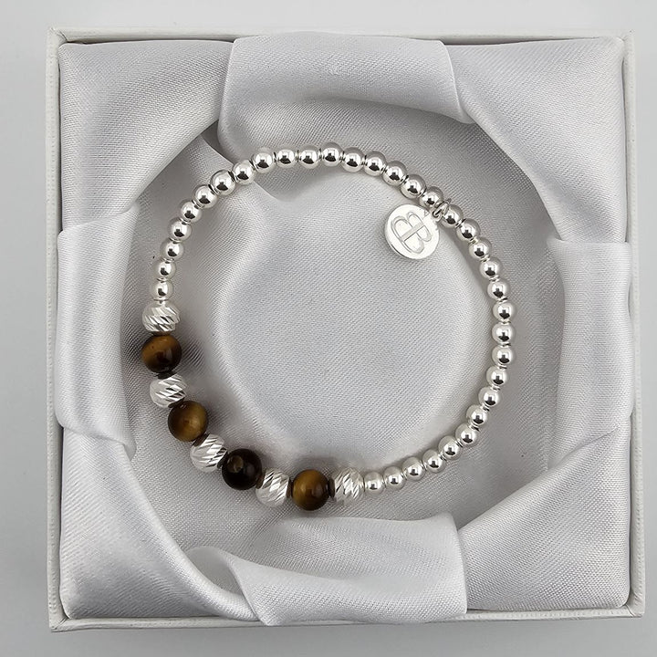 Handmade tiger’s eye bracelet with silver mooncut beads.