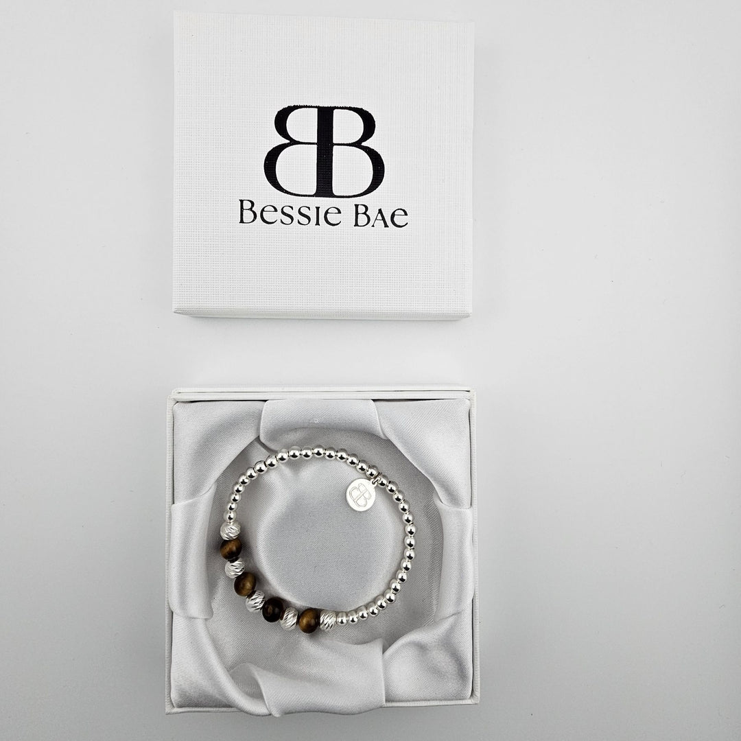 Sterling silver beaded bracelet featuring tiger’s eye stones.