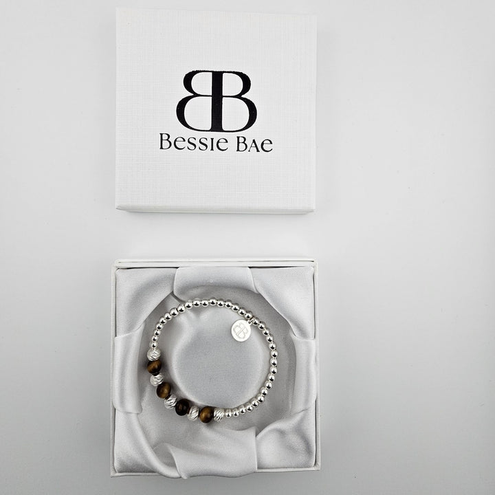 Sterling silver beaded bracelet featuring tiger’s eye stones.