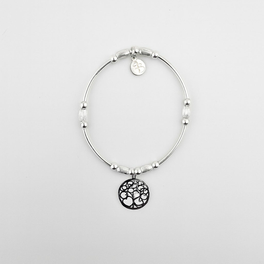 Sterling silver bracelet with Tree of Hearts charm.