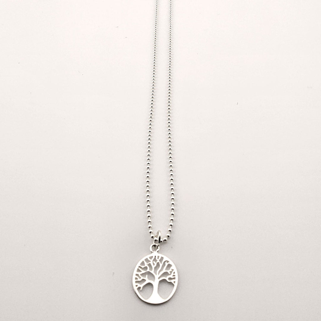 Sterling silver Tree of Life pendant necklace on fine chain.