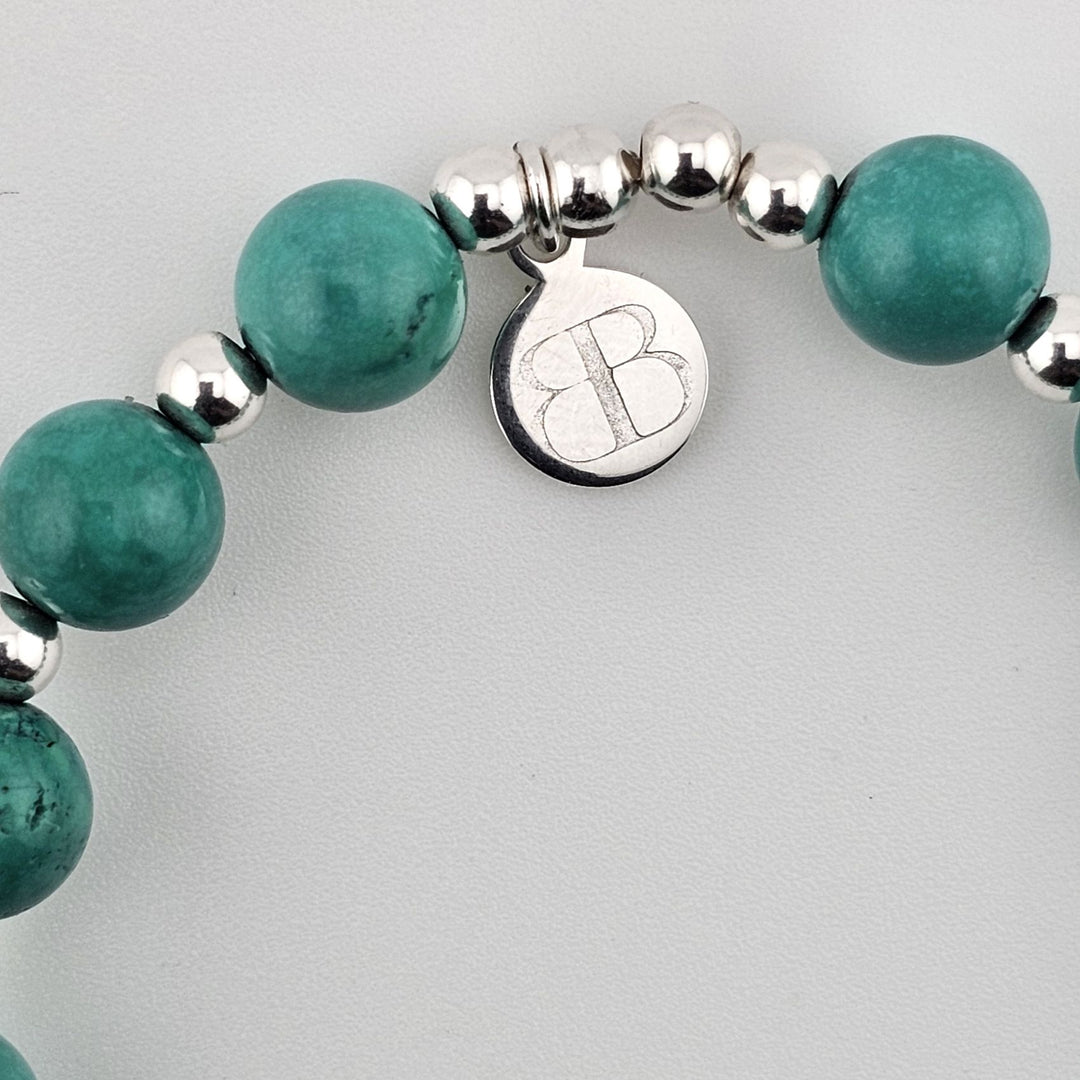 Turquoise and sterling silver Tree of Life bracelet for wellbeing.