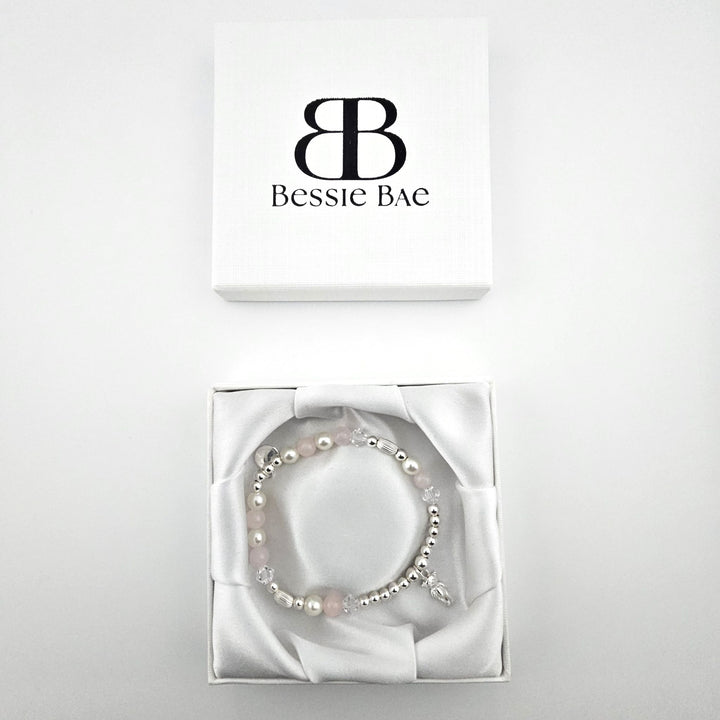 Delicate teddy bear charm bracelet with Rose Quartz and crystal beads in Bessie Bae gift box.