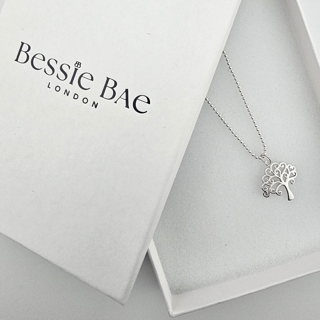 Bessie Bae Tree of Life necklace presented in complementary gift packaging.