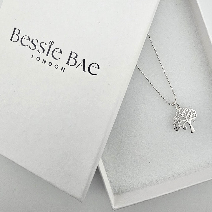 Bessie Bae Tree of Life necklace presented in complementary gift packaging.